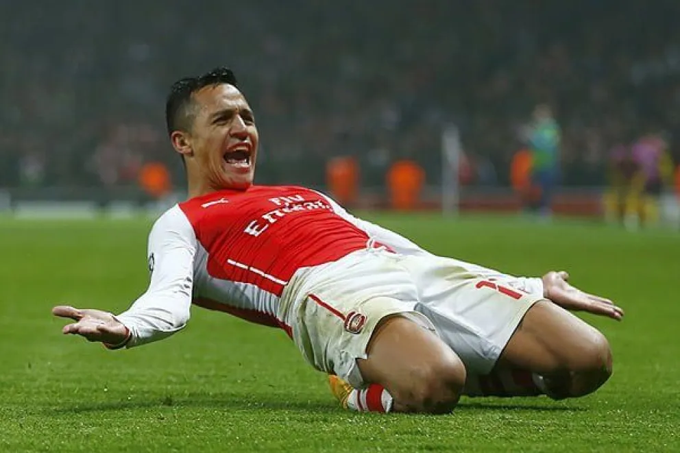 Arsenal's Sanchez celebrates his goal against Borussia Dortmund in Champions League match in London